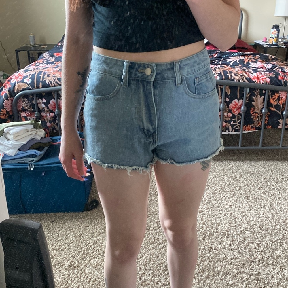 A pair of shorts with painted pockets
